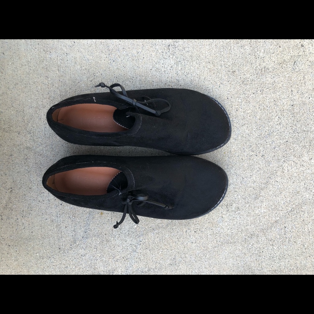 black suede loafer
